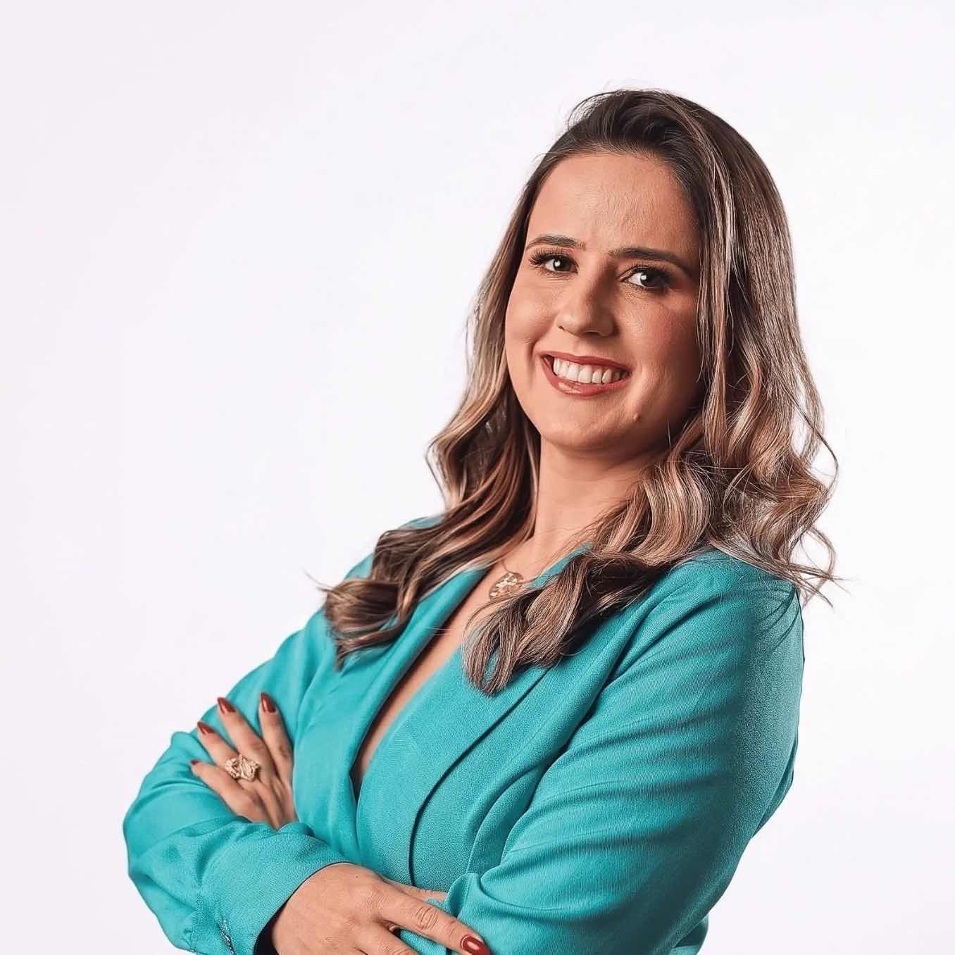 Retrato profissional feminino com terno turquesa